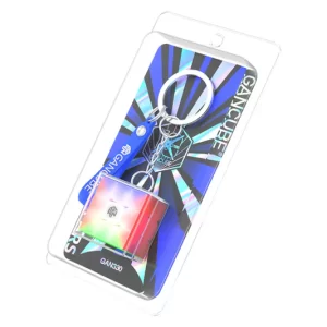 ✨ ¡UNA JOYA COLECCIONABLE! Mini cubo 3x3 totalmente funcional (3.3 cm) con: • Estuche transparente premium conmemorativo • Superficie honeycomb para giros ultrasuaves • Llavero metálico + base de exhibición ¡Edición limitada por 10º aniversario de GAN!